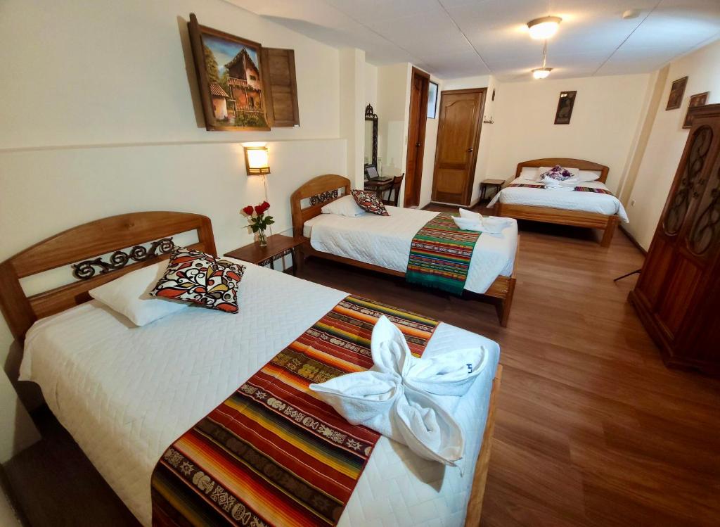 Postel nebo postele na pokoji v ubytování Mía Leticia B&B