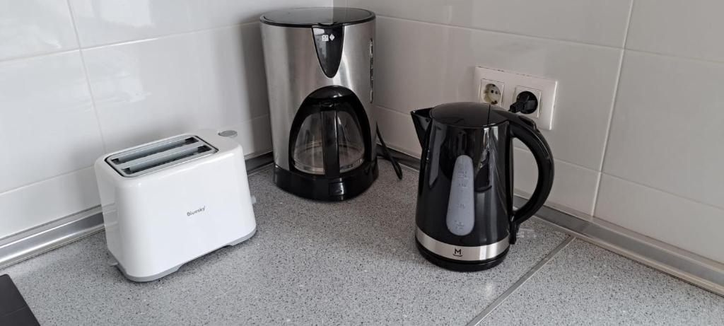 Příslušenství pro přípravu čaje a kávy v ubytování Apartment Travesia de Santomera