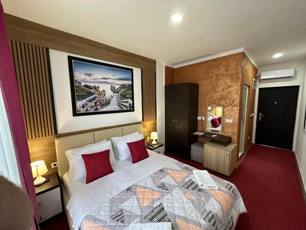 Postel nebo postele na pokoji v ubytování Hotel Halibas