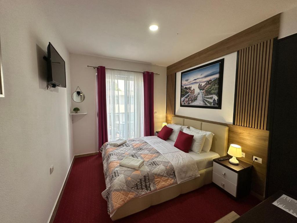 Postel nebo postele na pokoji v ubytování Hotel Halibas