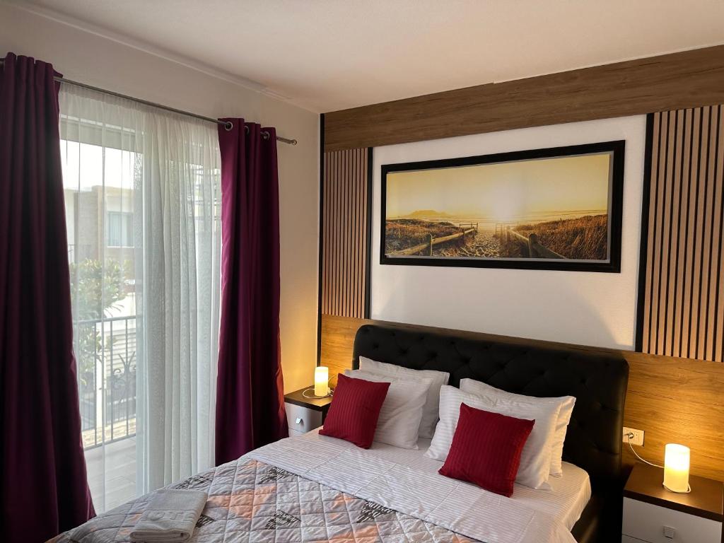 Postel nebo postele na pokoji v ubytování Hotel Halibas