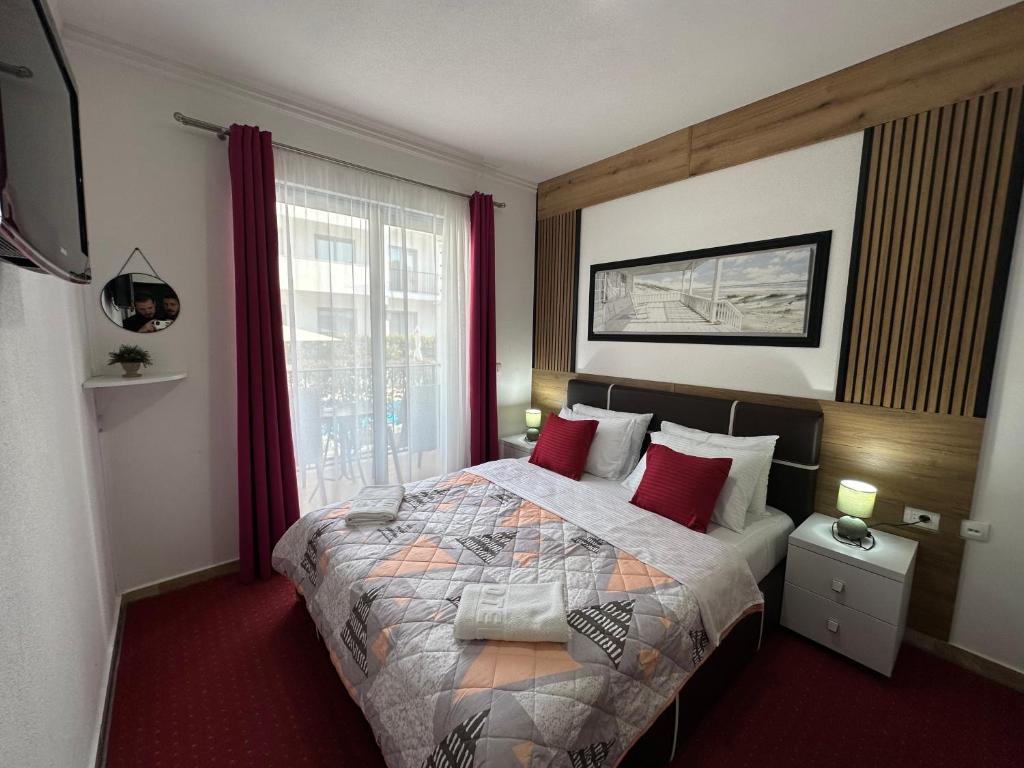 Postel nebo postele na pokoji v ubytování Hotel Halibas