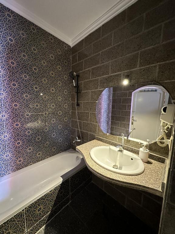 Koupelna v ubytování Ali Baba Hotel