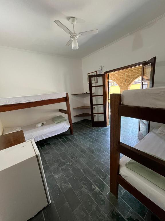 Postel nebo postele na pokoji v ubytování Hotel Bem Te Vi