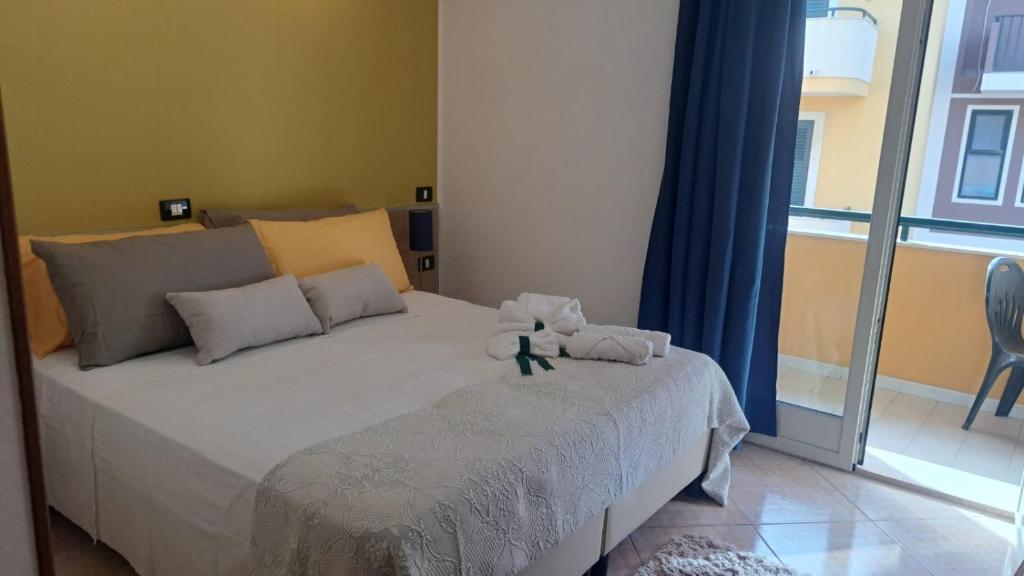 Postel nebo postele na pokoji v ubytování MariMare Bed and Breakfast