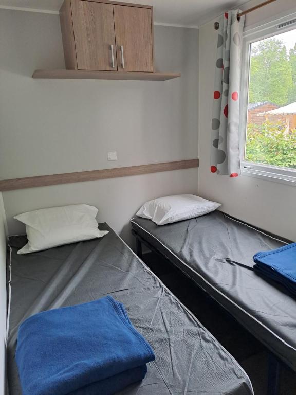 Postel nebo postele na pokoji v ubytování Mobile home