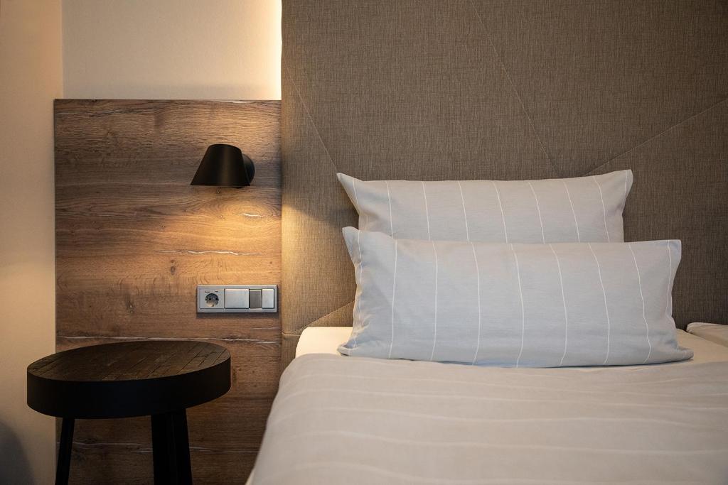 Postel nebo postele na pokoji v ubytování Hotel Imhof