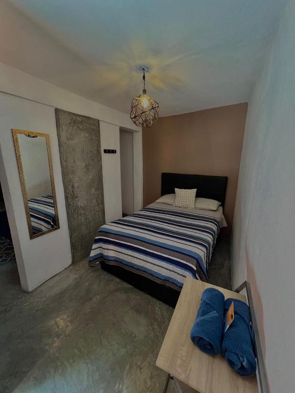 Postel nebo postele na pokoji v ubytování Casa 86