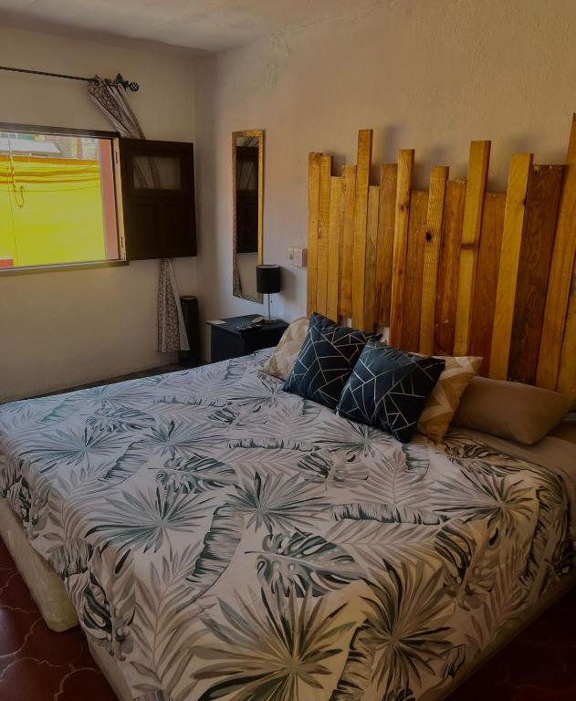 Postel nebo postele na pokoji v ubytování Casa 86