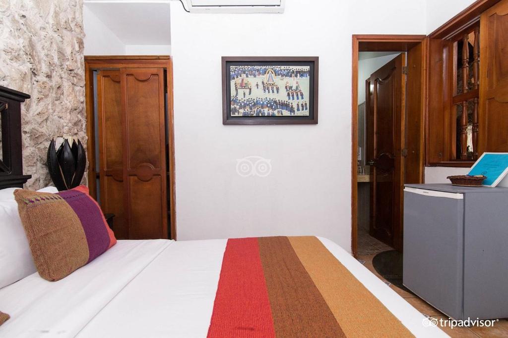 Postel nebo postele na pokoji v ubytování Casa Del Curato