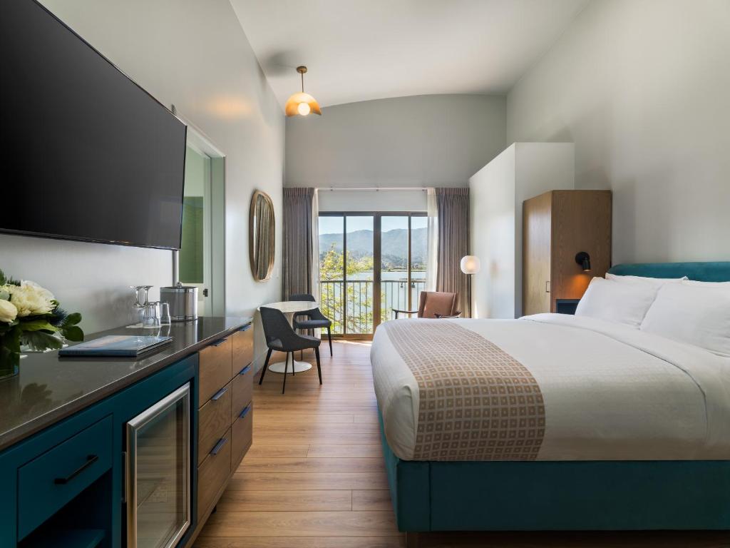 Postel nebo postele na pokoji v ubytování Acqua Hotel