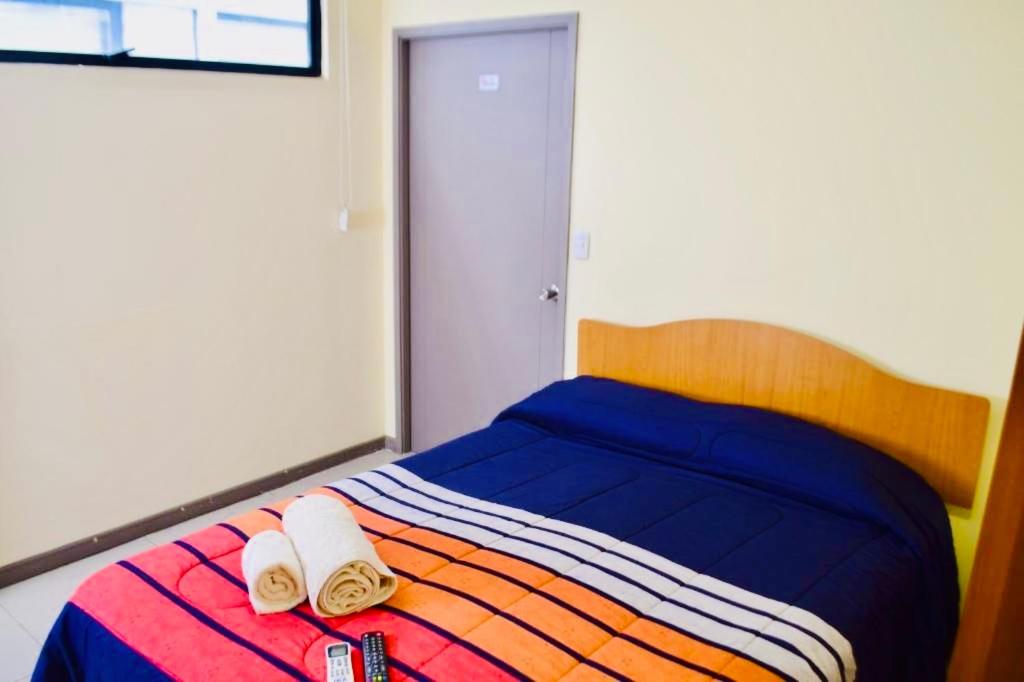 Postel nebo postele na pokoji v ubytování Hotel Blu Bascuñan