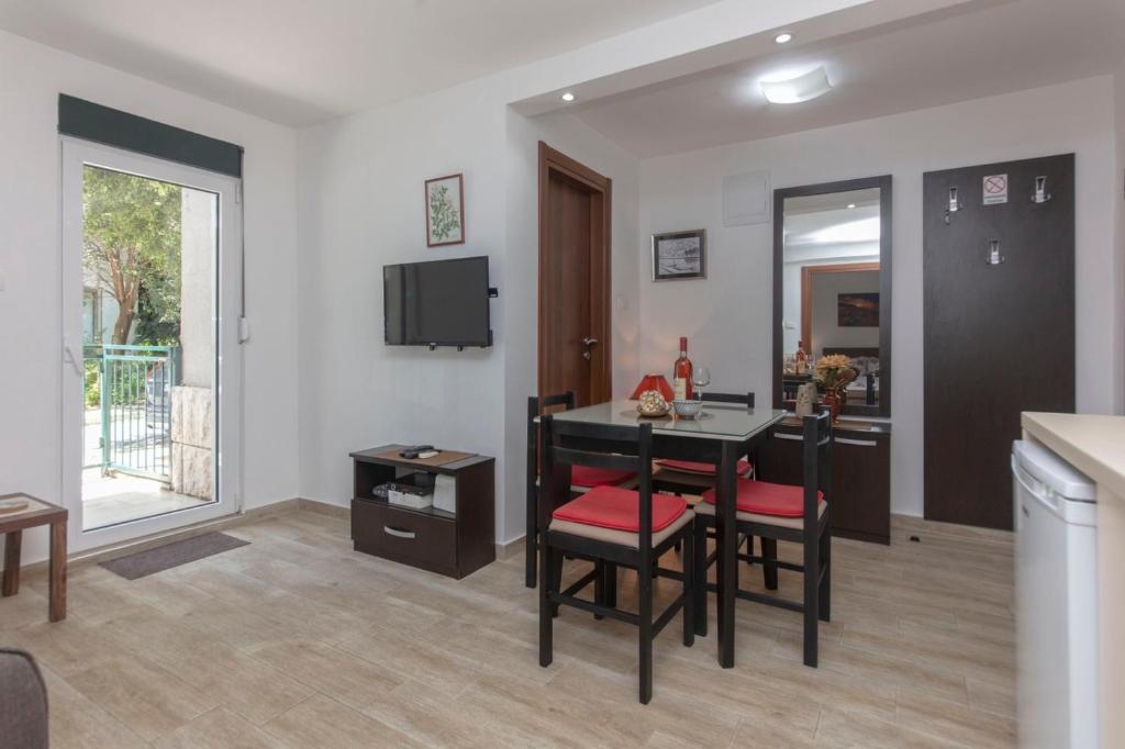 TV a/nebo společenská místnost v ubytování Apartment Dea