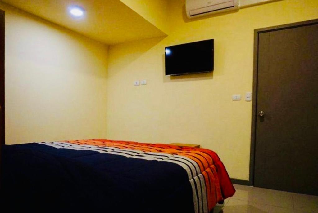 TV a/nebo společenská místnost v ubytování Hotel Blu Bascuñan