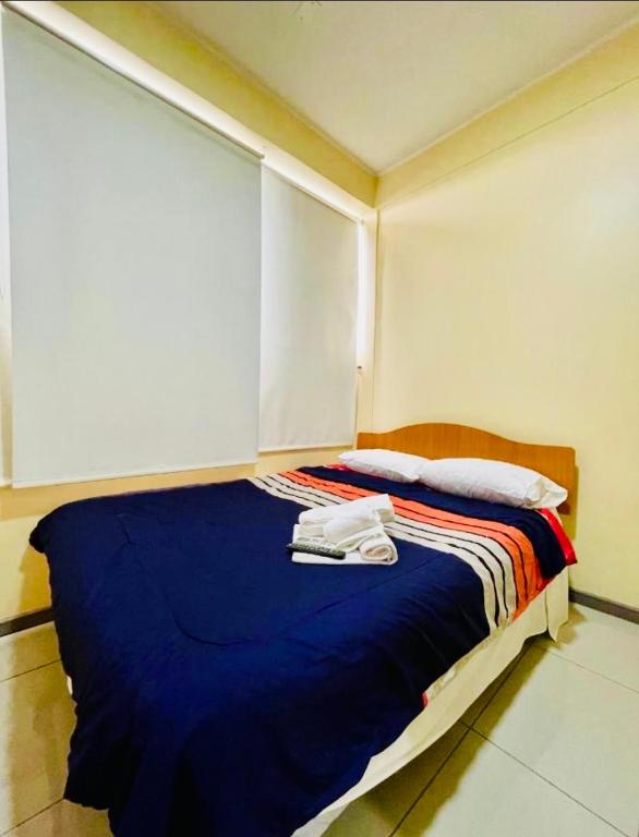 Postel nebo postele na pokoji v ubytování Hotel Blu Bascuñan