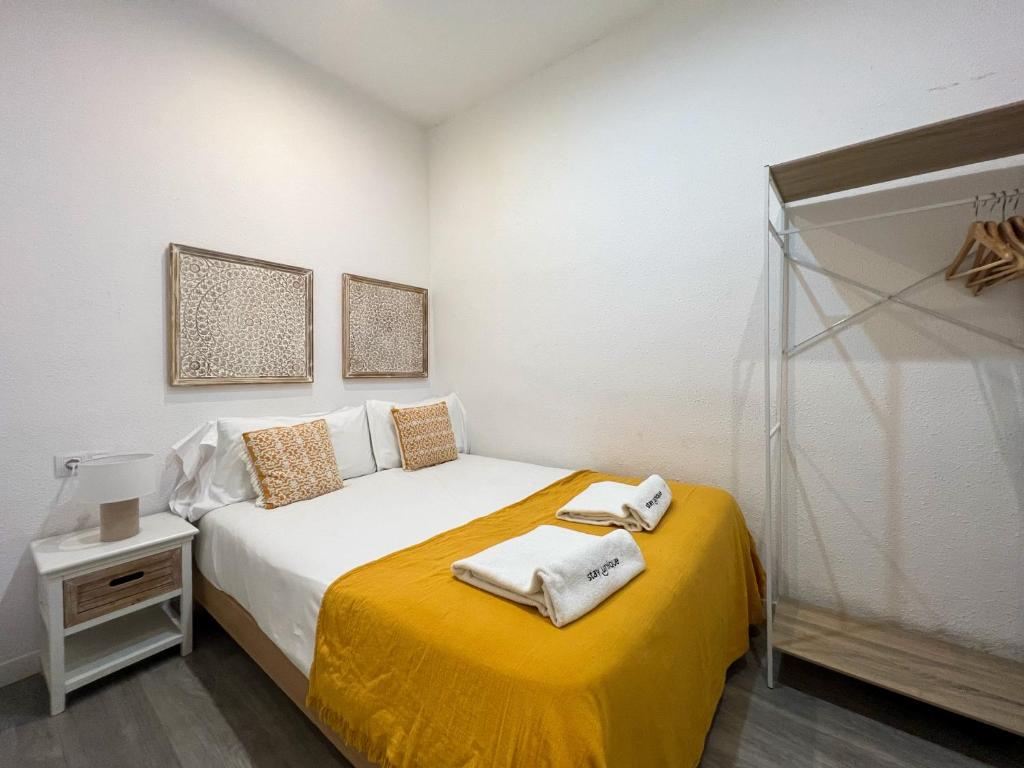 Posteľ alebo postele v izbe v ubytovaní Stay U-nique Apartments Rossello