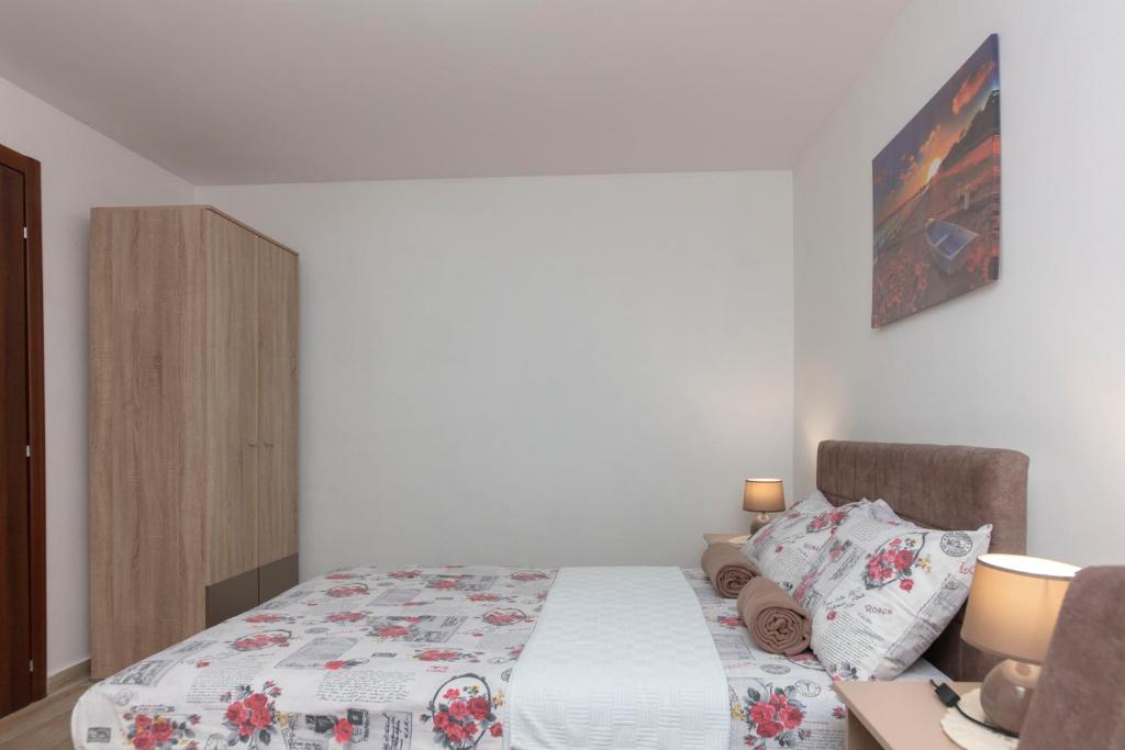 Postel nebo postele na pokoji v ubytování Apartment Dea