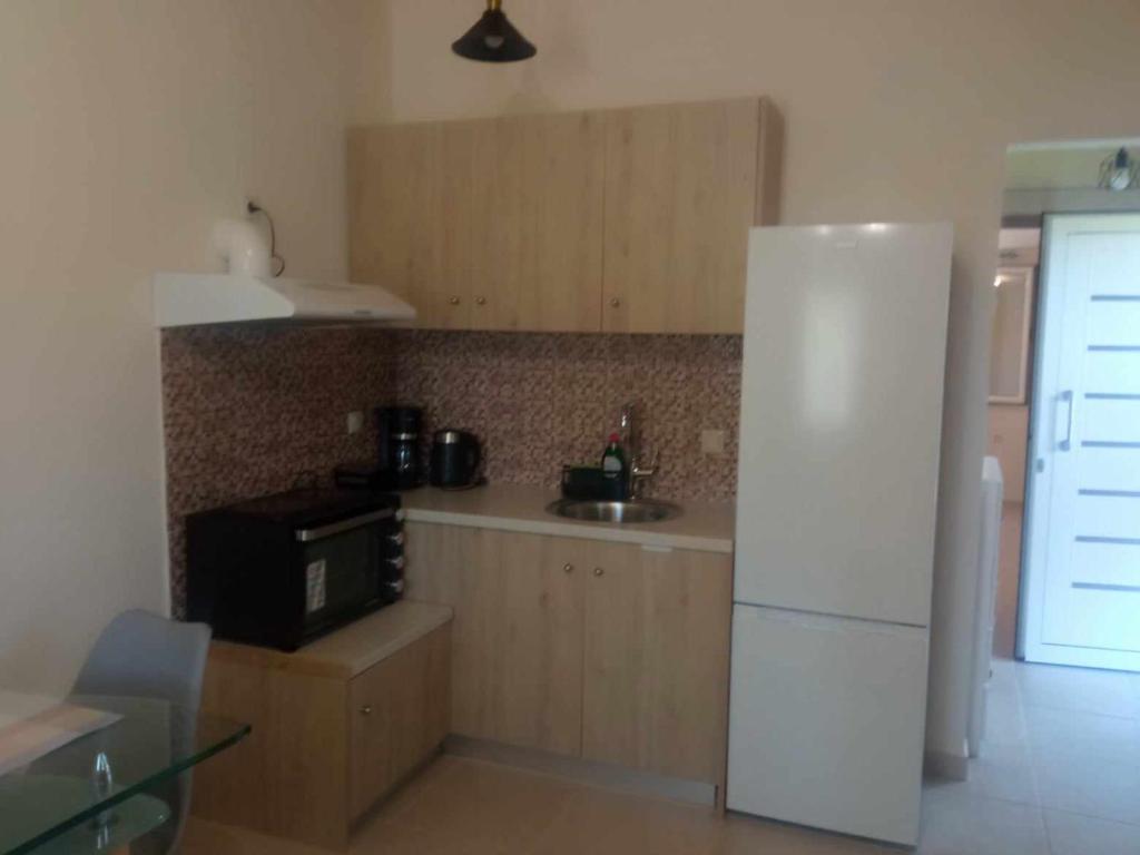 Kuchyň nebo kuchyňský kout v ubytování Galini Home