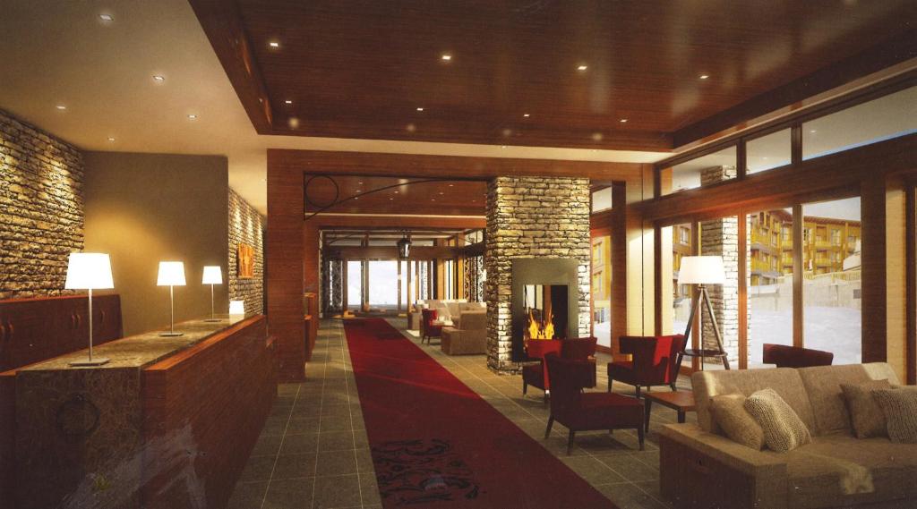 Гостиная зона в Appart'Hotel Prestige Odalys Eden