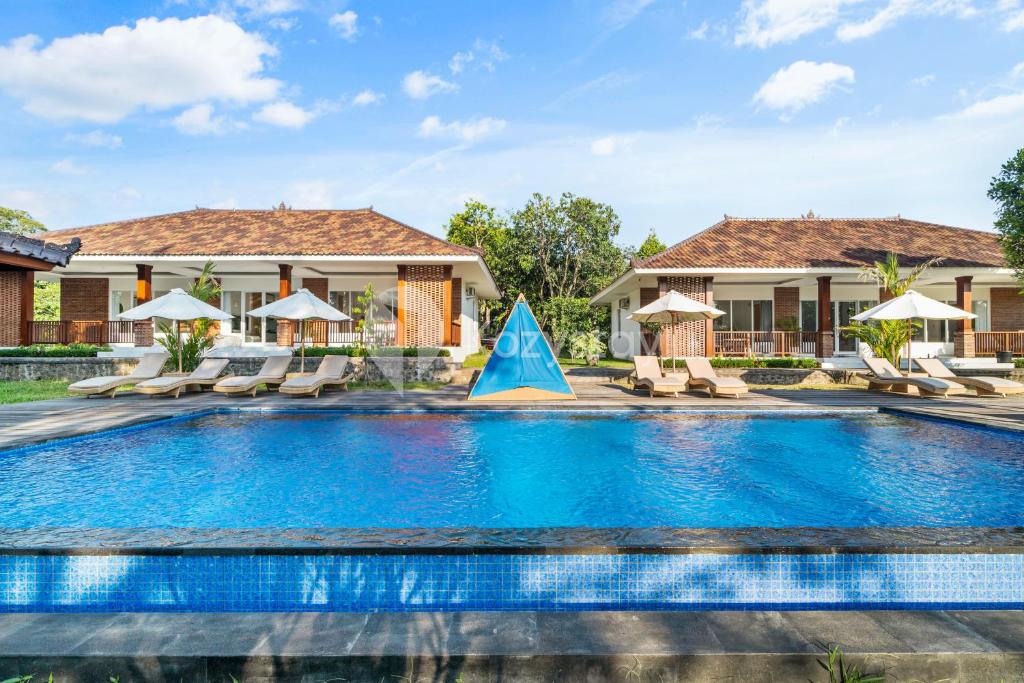 Bazén v ubytování Kana Village Villa by Kozystay - Near Canggu nebo v jeho okolí