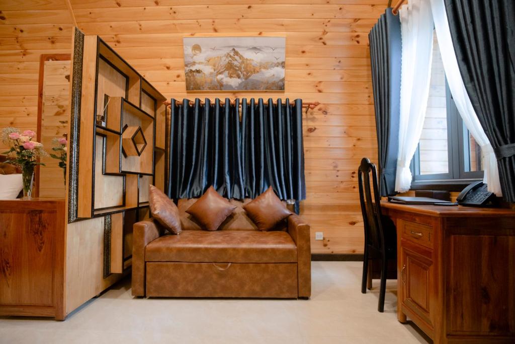 Televiisor ja/või meelelahutuskeskus majutusasutuses Resort Hàng Dương