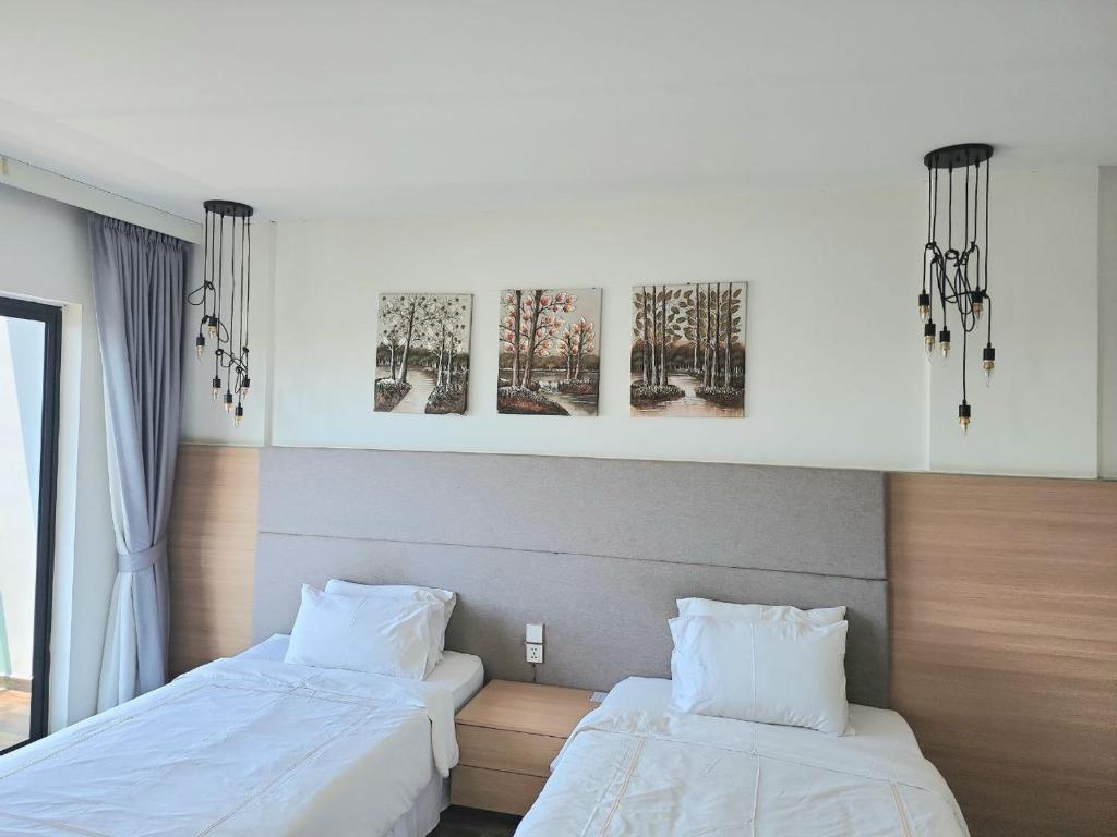 Postel nebo postele na pokoji v ubytování CHILCHILL Hotel Riverside