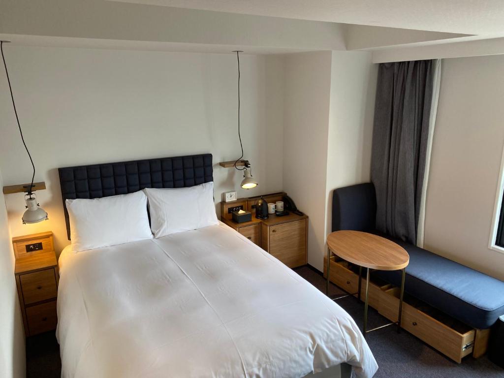 Postel nebo postele na pokoji v ubytování Hotel Resol Stay Akihabara