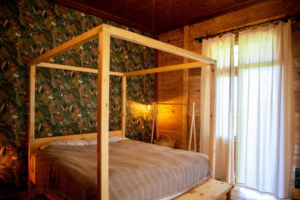Postel nebo postele na pokoji v ubytování Shromantic Garden