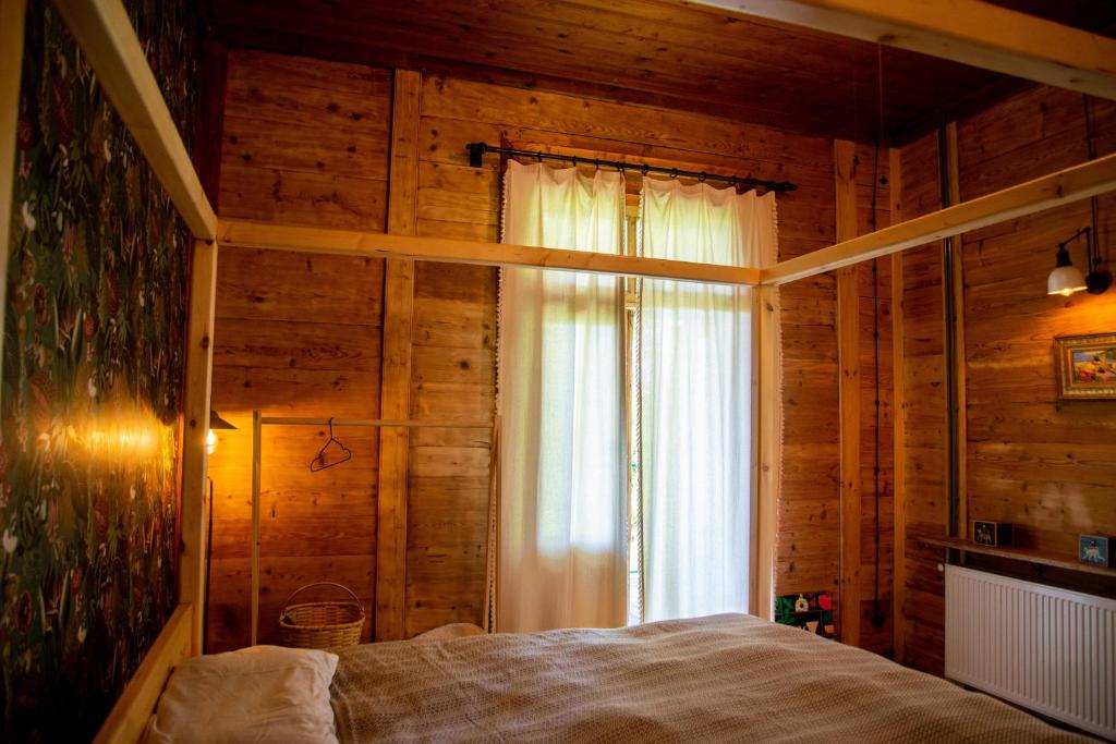 Postel nebo postele na pokoji v ubytování Shromantic Garden