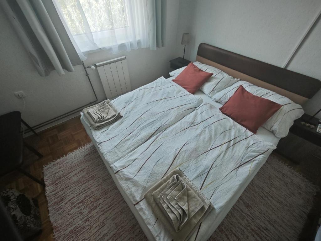 Posteľ alebo postele v izbe v ubytovaní Valley Vendégház