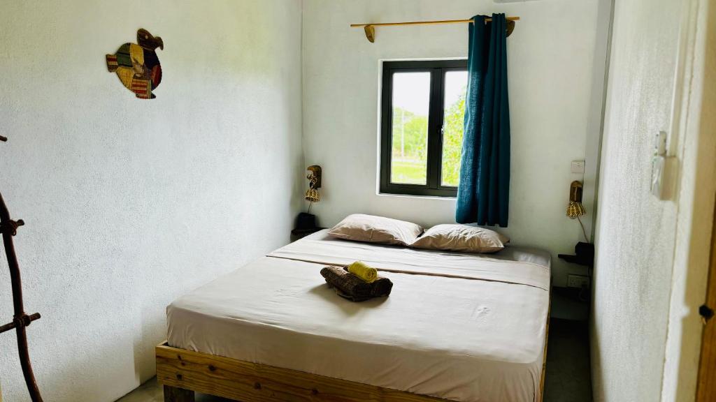 Postel nebo postele na pokoji v ubytování Ti Kaséou 1
