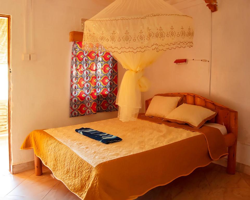Postel nebo postele na pokoji v ubytování Kalebas Campsite
