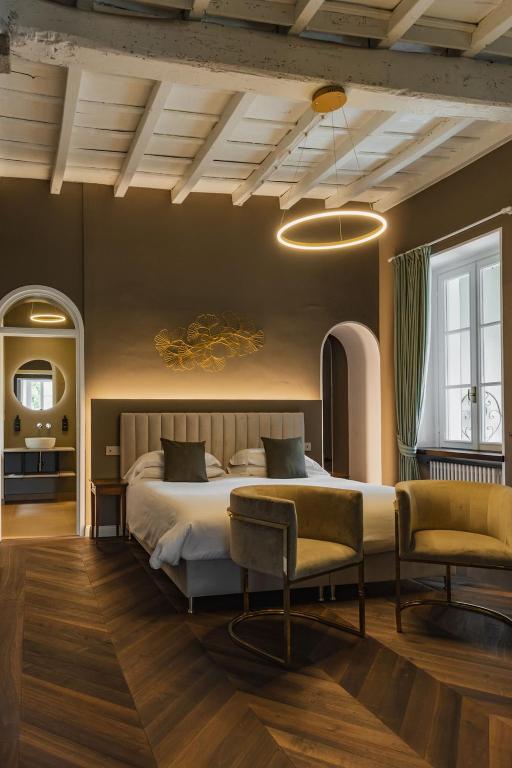 Postel nebo postele na pokoji v ubytování Villa Antica Colonia SPA & Wellness