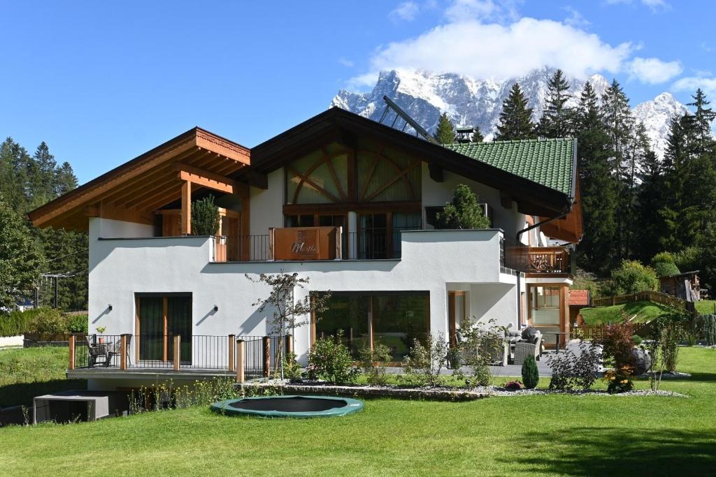 Vonkajšia záhrada v ubytovaní Apartment Sonnenspitze