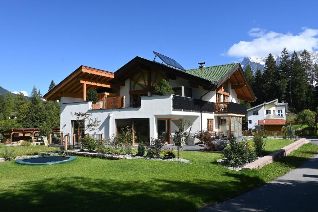 Vonkajšia záhrada v ubytovaní Apartment Sonnenspitze