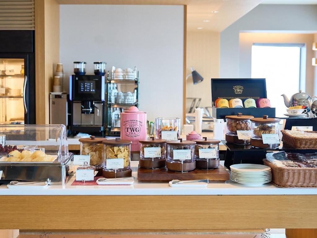 a bakery counter with many different types of pastries at Cerulean Tower Tokyu Hotel, A Pan Pacific Partner Hotel in Tokyo
