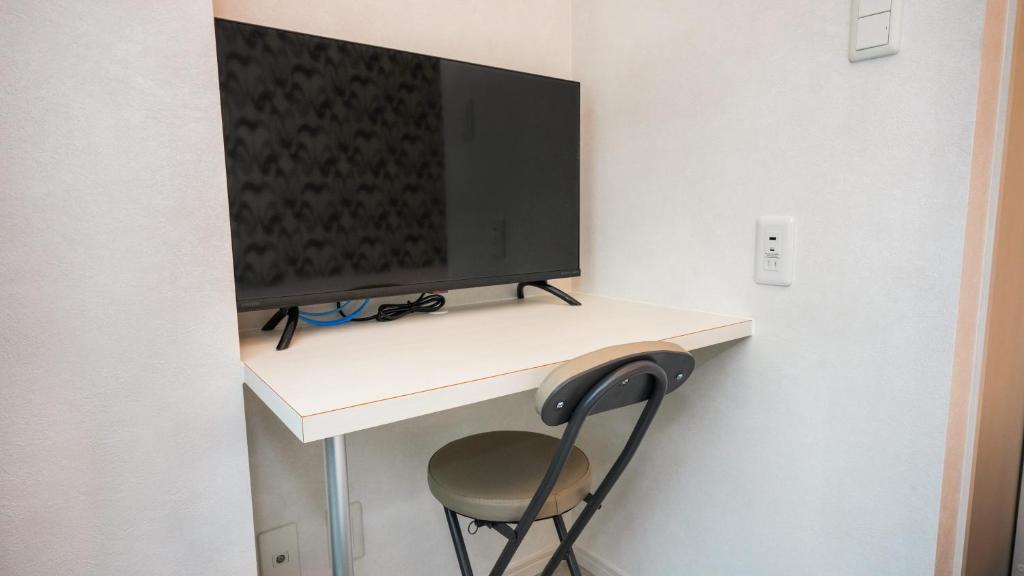 TV a/nebo společenská místnost v ubytování CoCo SPACE