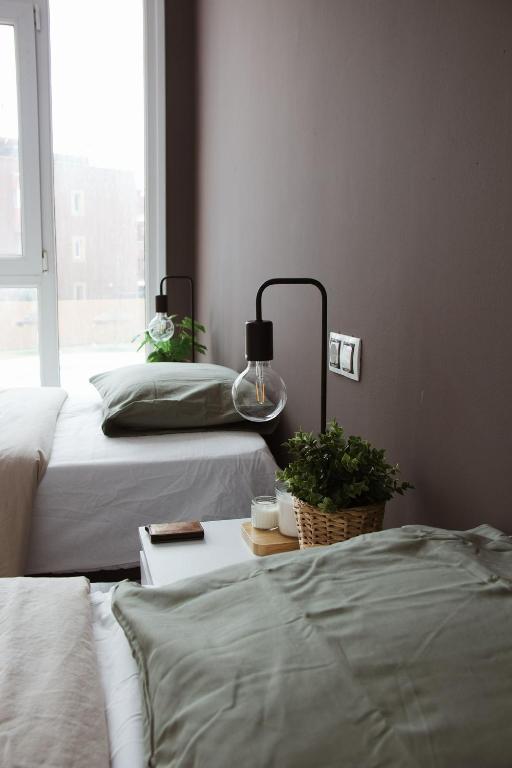 Postel nebo postele na pokoji v ubytování Banama Coliving & Coworking, Surf & Yoga - Casa Roja