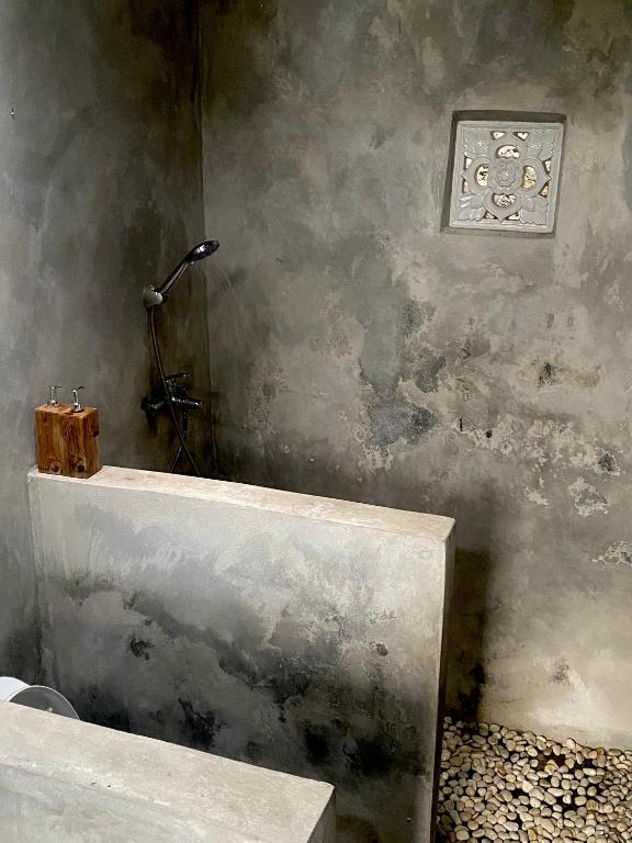 Postel nebo postele na pokoji v ubytování Uma d'Nyuh Homestay