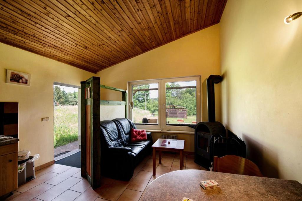 Posezení v ubytování Krüseliner Mühle - Bungalow Rethra