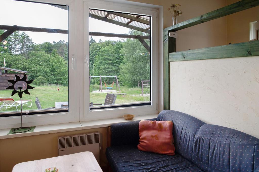 Posezení v ubytování Krüseliner Mühle - Bungalow Rethra