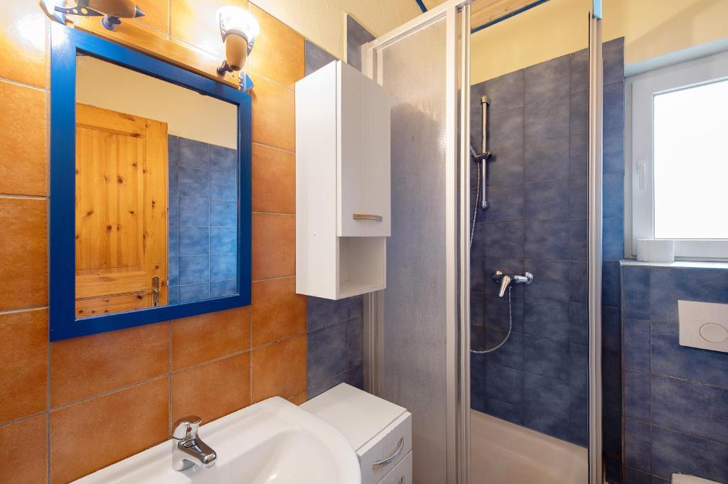 Koupelna v ubytování Krüseliner Mühle - Bungalow Rethra