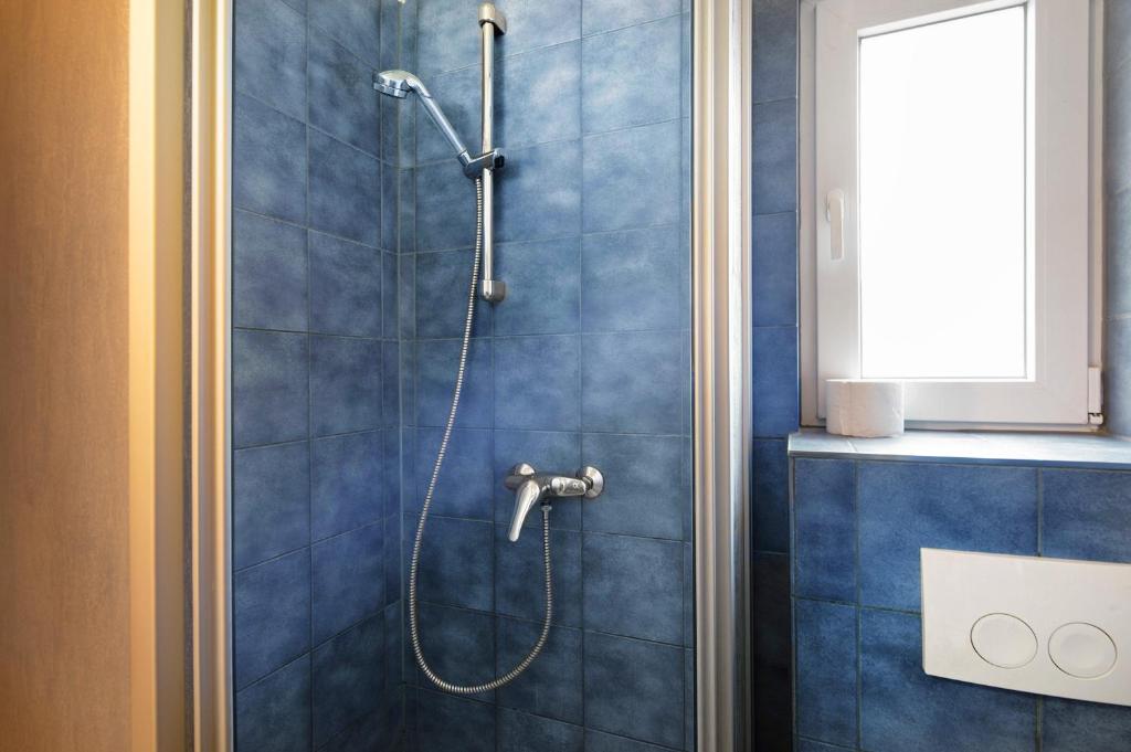 Koupelna v ubytování Krüseliner Mühle - Bungalow Rethra