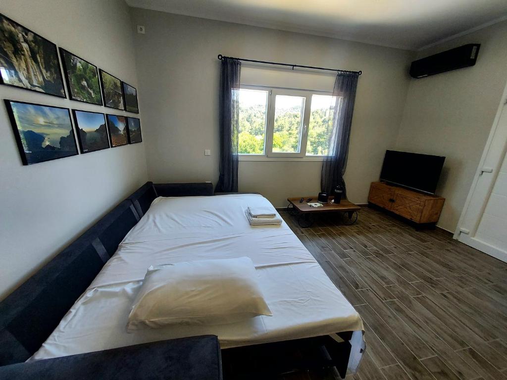 Postel nebo postele na pokoji v ubytování Arianas apartment