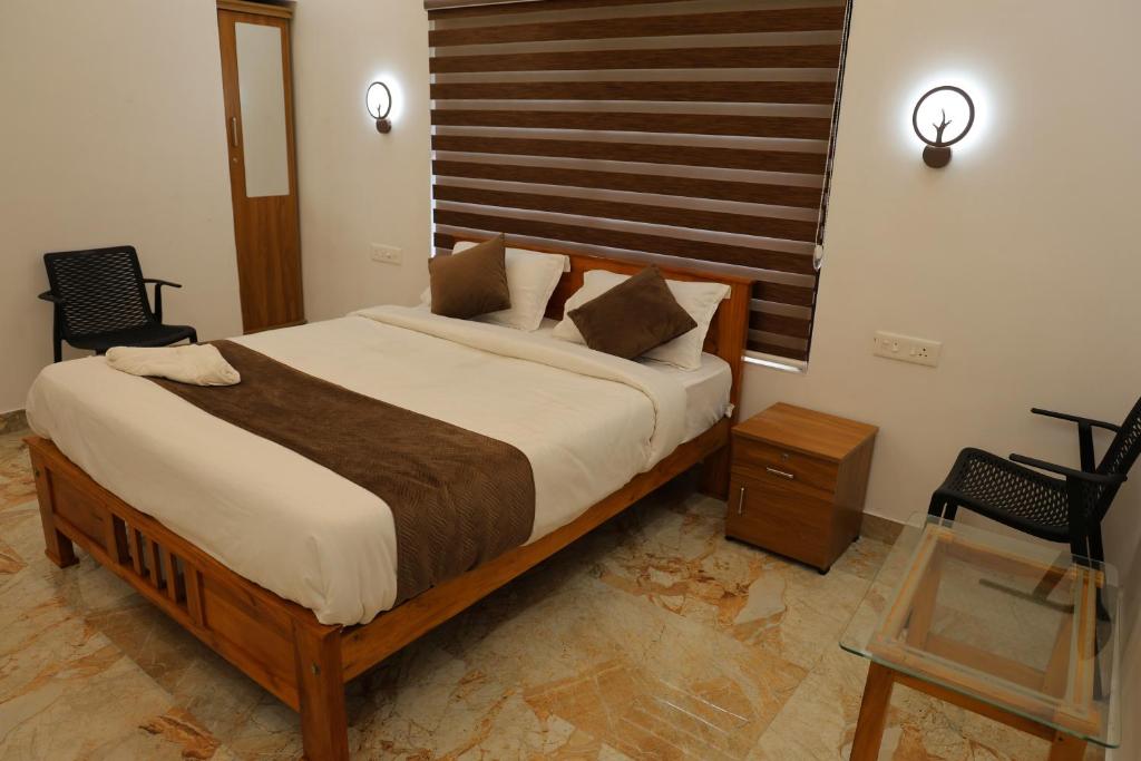 Llit o llits en una habitació de Josebaa Inn