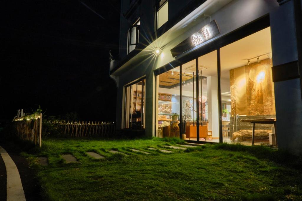 Um jardim no exterior de Nature Cure Village Lodge-婺源自在舍