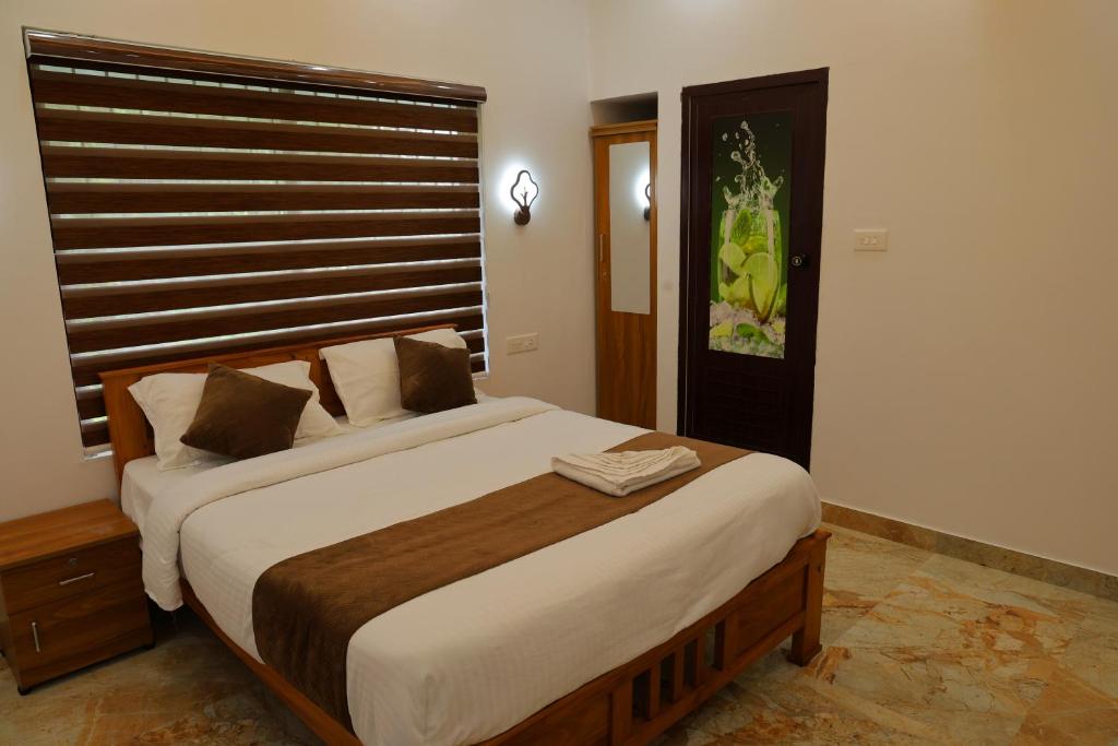 Llit o llits en una habitació de Josebaa Inn