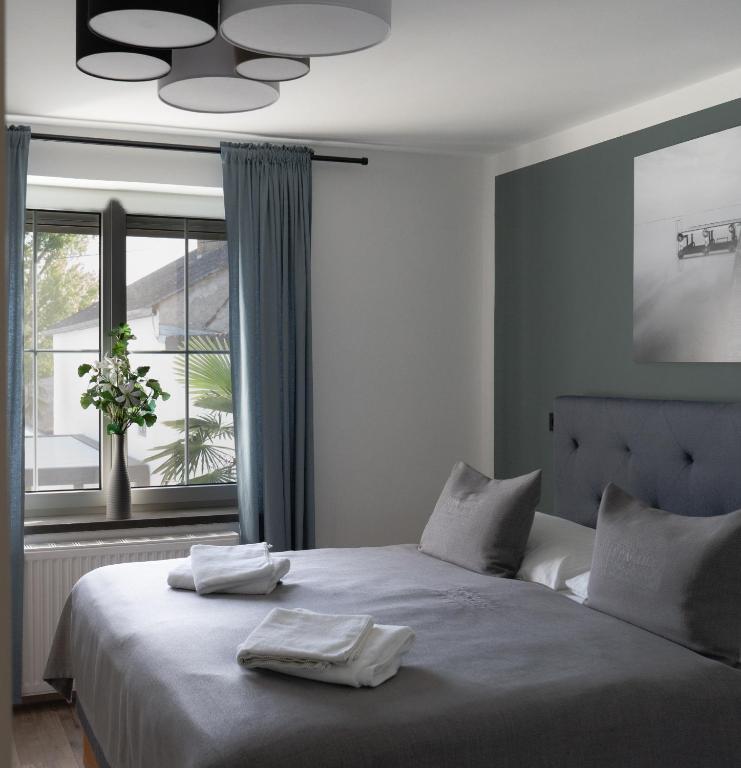 Voodi või voodid majutusasutuse KRACHER Apartment No 1 - inklusive Pool toas