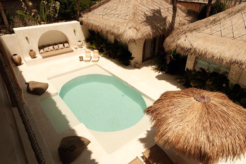 Der Swimmingpool an oder in der Nähe von CASA ULU Boutique Hotel and Retreat, Adult-only, Uluwatu