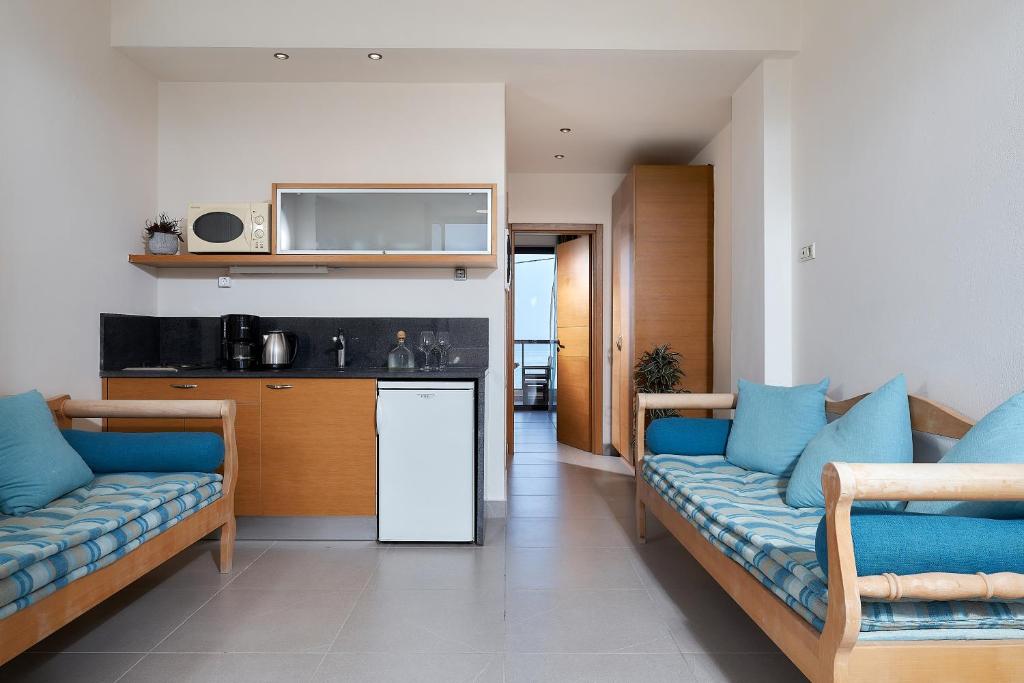 Kuchyň nebo kuchyňský kout v ubytování Creteco Hotel & Suites